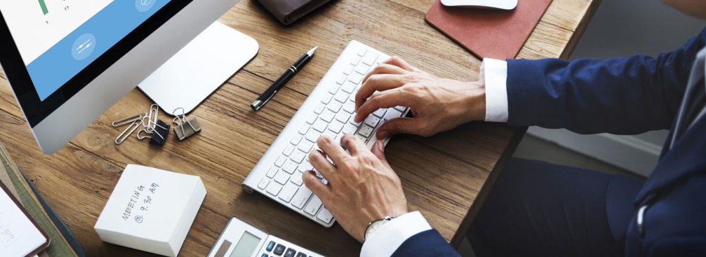 Header Man on Computer